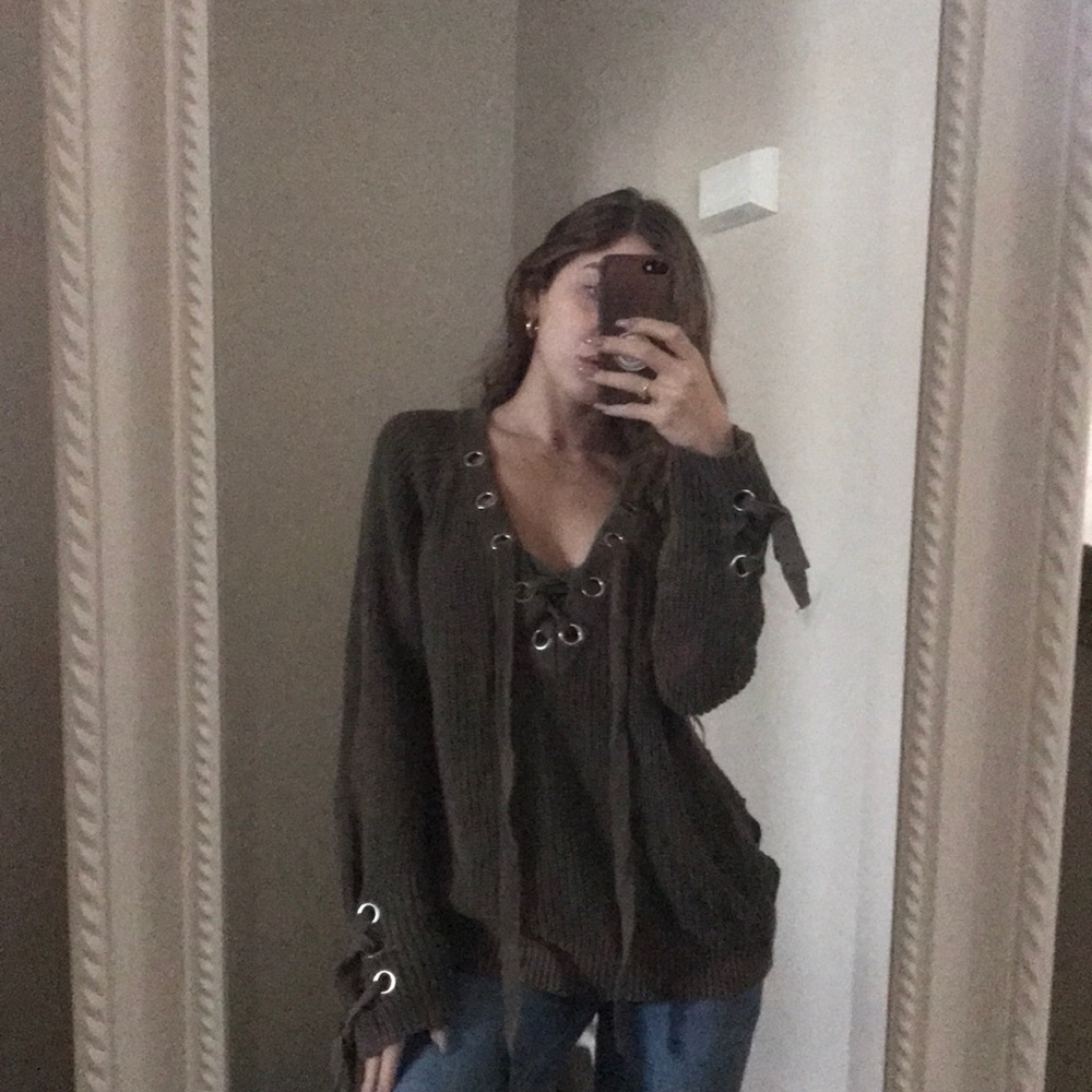 V neck green sweater with lace up ties